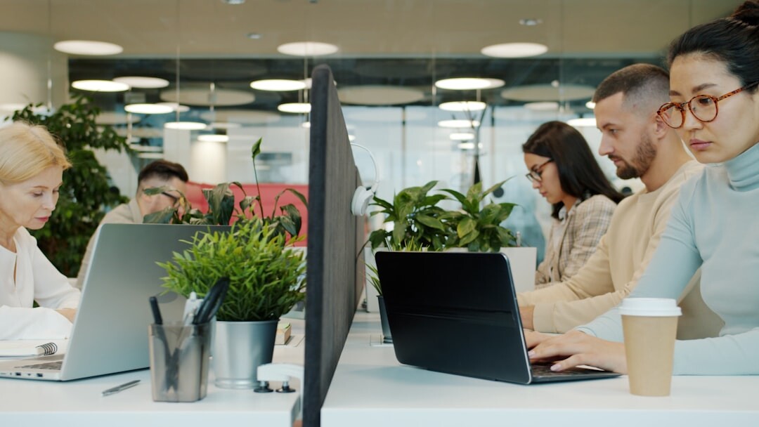 Team of professionals working together in a modern office