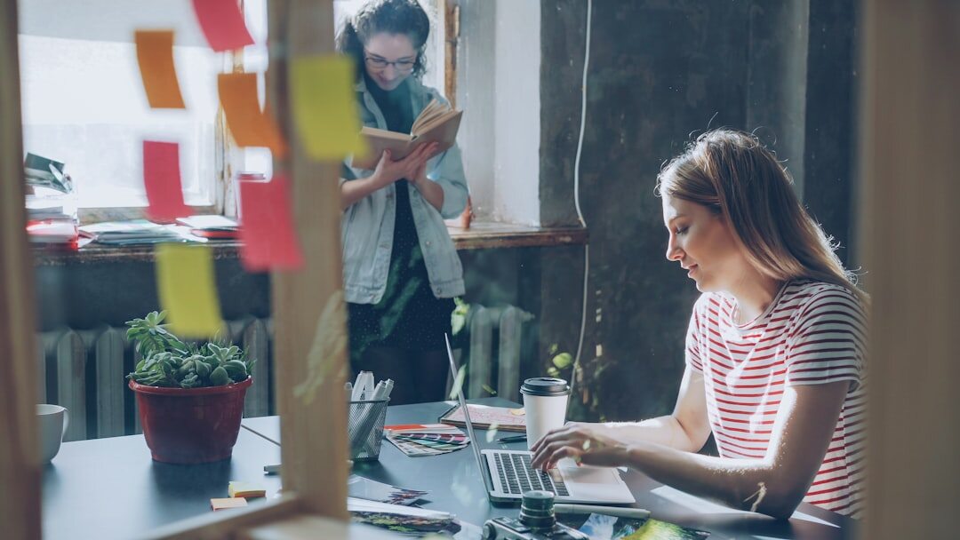 woman typing on laptop