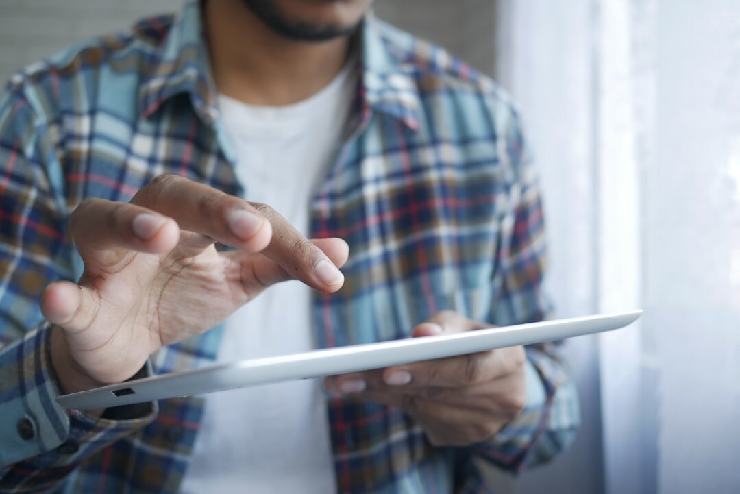 person reading on tablet